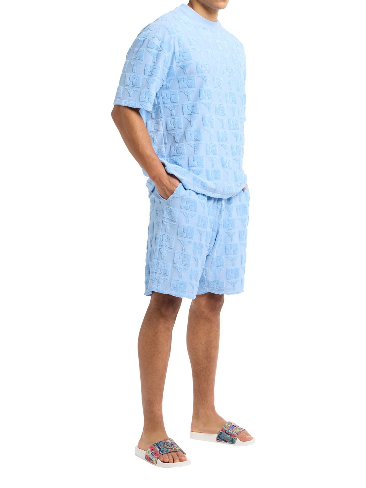 OVERSIZED SHORTS MET BADSTOF INZETSTUKKEN BLUE.