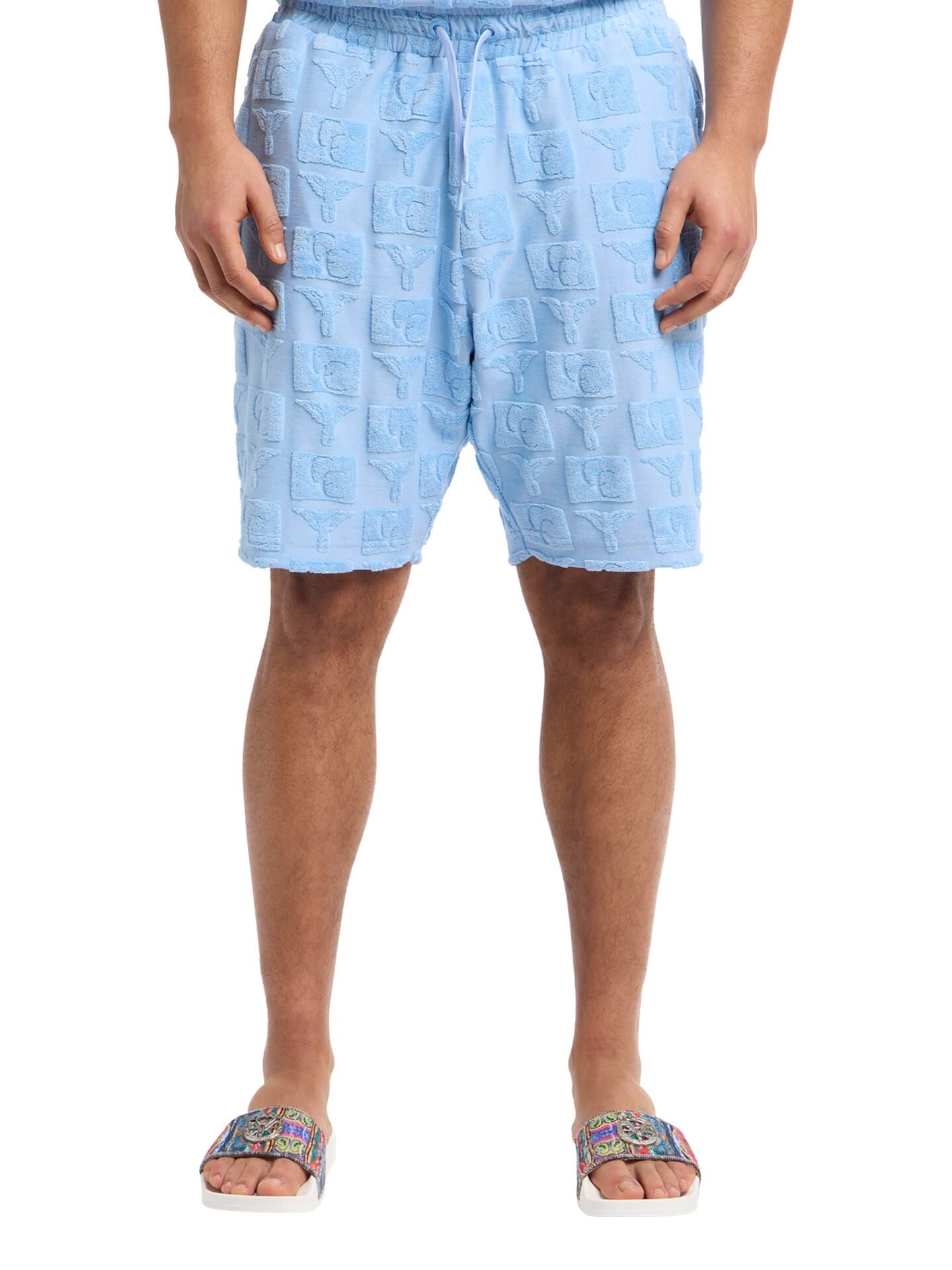 OVERSIZED SHORTS MET BADSTOF INZETSTUKKEN BLUE.