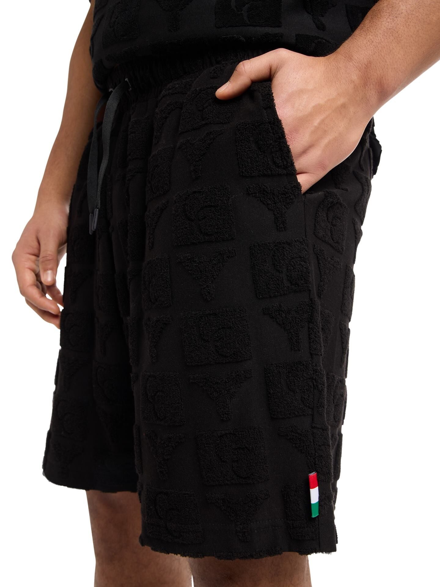 OVERSIZED SHORTS MET BADSTOF INZETSTUKKEN BLACK